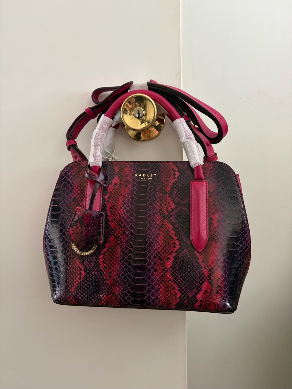 RADLEY LONDON Fuschia and Black Snake-Print Dome Satchel